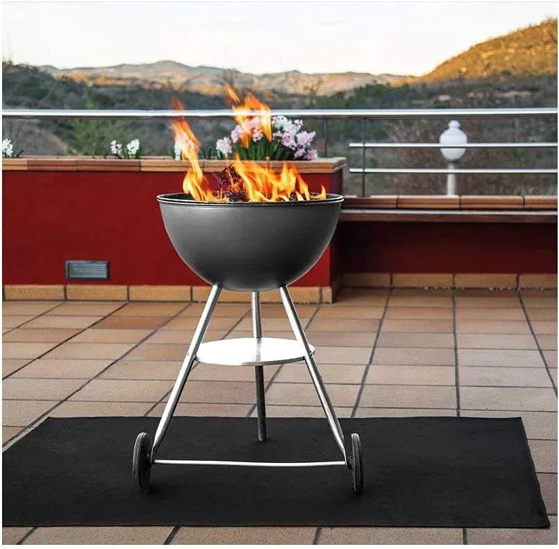 Fire pit mat used under outdoor fire pit on patio deck