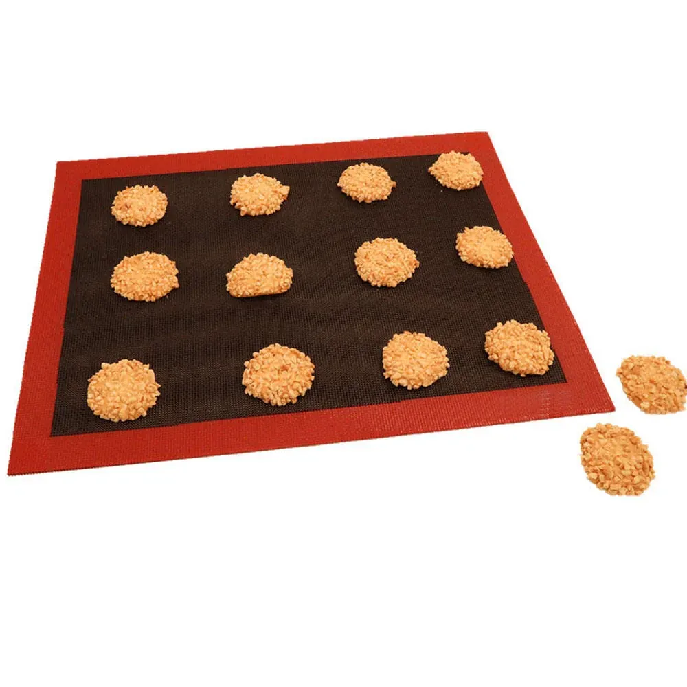 Silicone mesh mat used for cookie baking on white background