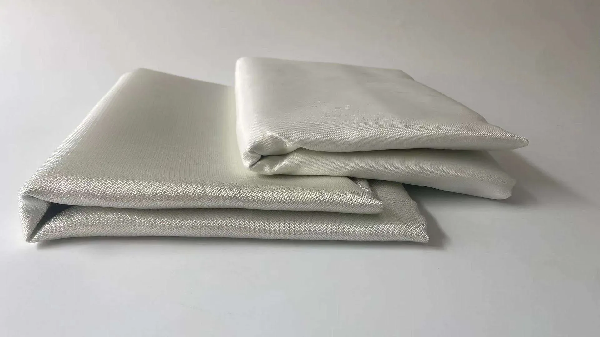 PTFE coated glass fabric roll on clean background